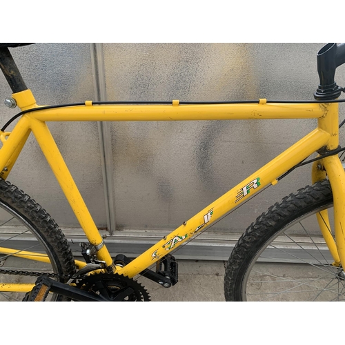 1309 - A STARLIFTER YELLOW MEN'S MOUNTAIN BIKE, 15 SHIMANO GEARS