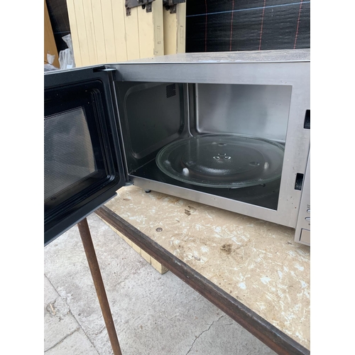 1320 - A PANASONIC INVERTER MICROWAVE - BELIEVED TO BE IN WORKING ORDER BUT NO WARRANTY