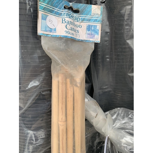 1322 - SEVEN ROLLS OF NEW PLASTIC GARDEN POTS AND A PACK OF 20 BAMBOO CANES