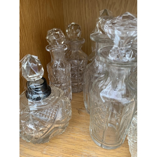 1327 - A COLLECTION OF SCENT OR VINEGAR BOTTLES AND A COBALT BLUE CANDLE STICK