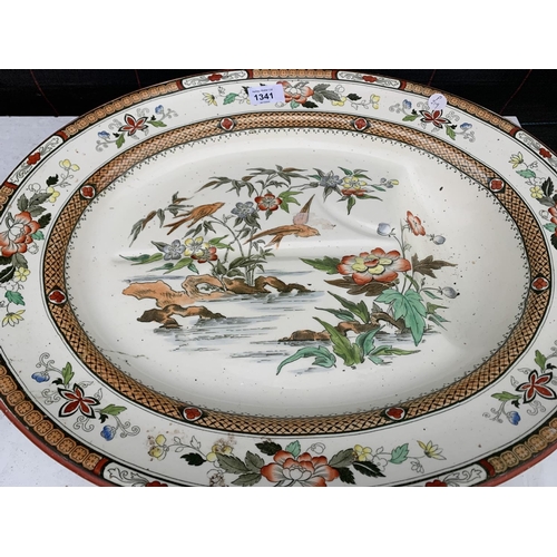 1341 - THREE LARGE ORIENTAL MEAT AND VEGETABLE PLATTERS AND FURTHER LARGE SERVING PLATTER