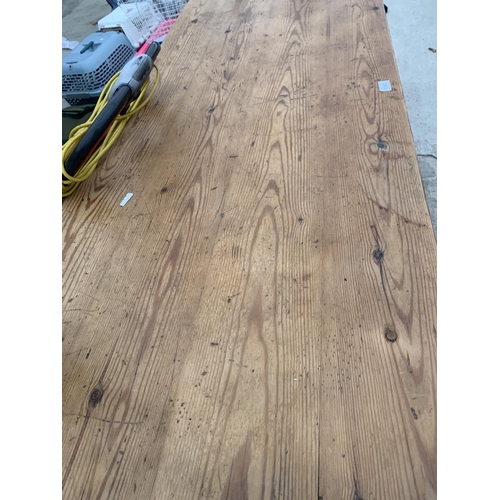 1382 - A LARGE WOODEN KITCHEN TABLE