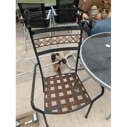 1423 - A GARDEN BISTRO TABLE AND TWO METAL CHAIRS