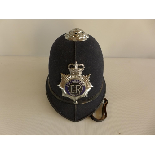 313 - A BEDFORDSHIRE POLICE HELMET