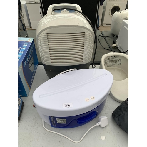 1745 - A DELONGHI DEHUMIDIFIER, A GERMEX BRUSH AND COMB SANITISER ETC BELIEVED TO BE IN WORKING ORDER BUT N... 