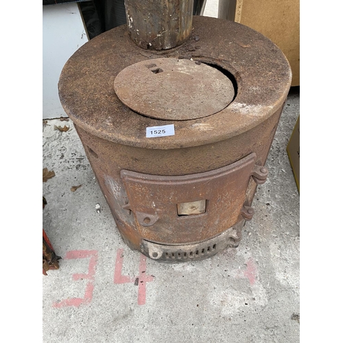 1525 - A CYLINDRICAL CAST IRON LOG BURNER