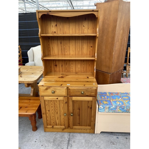 2148 - A MODERN PINE DRESSER COMPLETE WITH PLATE RACK, 31.5