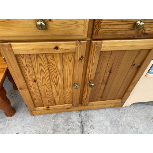 2148 - A MODERN PINE DRESSER COMPLETE WITH PLATE RACK, 31.5