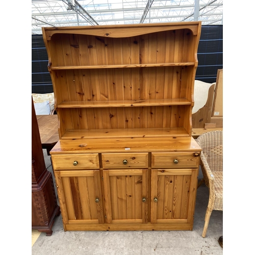 2150 - A MODERN PINE DRESSER COMPLETE WITH PLATE RACK, 47