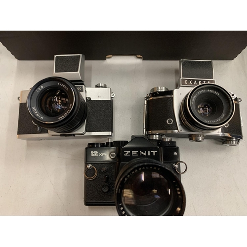 120 - A ZENIT CAMERA AND TWO EXAKTA CAMERA, VARIOUS LENSES AND TWO CASES