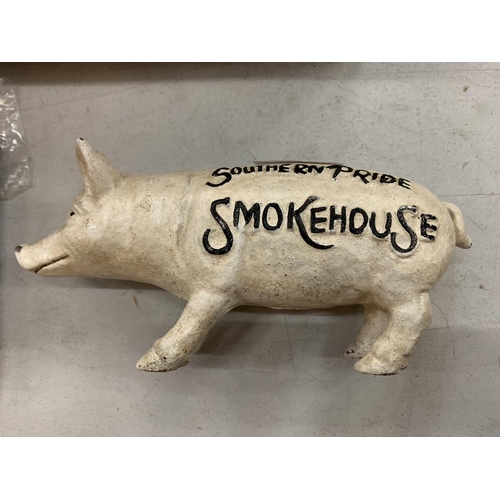 124 - A SOUTHERN PRIDE SMOKEHOUSE CAST METAL MONEY PIG