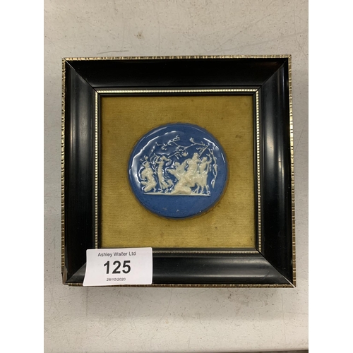 125 - A FRAMED JASPERWARE PLAQUE