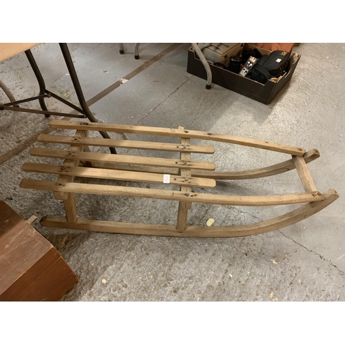 136a - A VINTAGE WOODEN SLEDGE