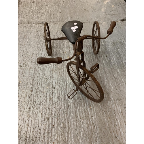 177 - A VINTAGE WOODEN AND METAL CHILDS TRICYCLE