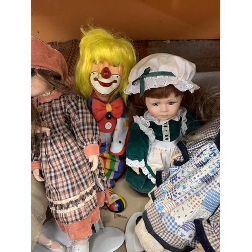 266 - FIVE PORCELAIN HEADED DOLLS TO INCLUDE A CLOWN