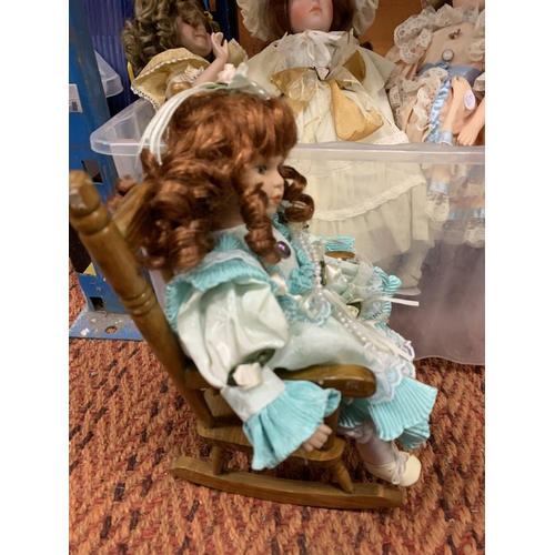 268 - FOUR PORCELAIN HEADED DOLLS TO INCLUDE CAROLINE IN A SMALL WOODEN ROCKER