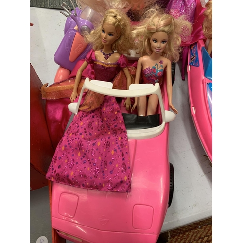 282 - A BARBIE CAR, BOAT AND SCOOTER WITH SIX DOLLS AND FURTHER ITEMS