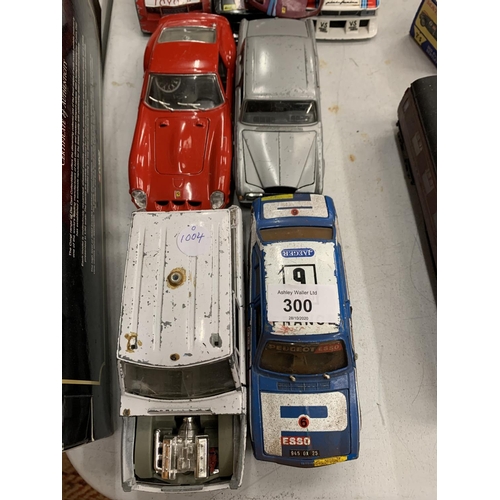 300 - A GROUP OF LARGE DIE CAST CARS TO INCLUDE TOYOTA, JAGUAR ETC