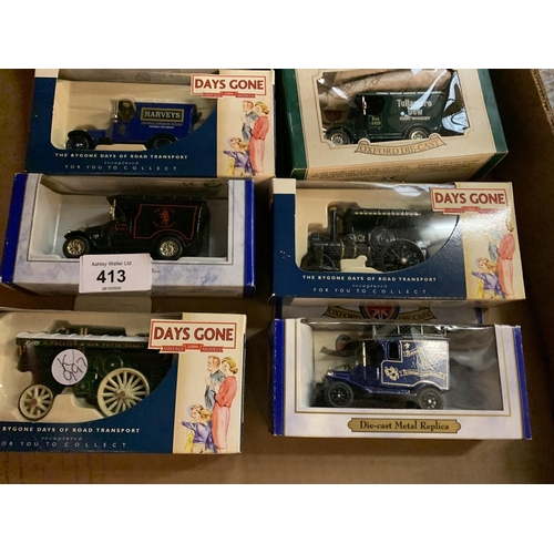 413 - AN ASSORTMENT OF BOXED VINTAGE MODEL CARS