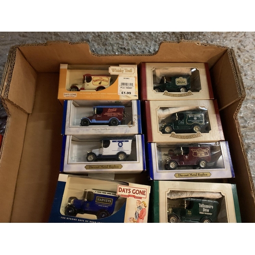 413 - AN ASSORTMENT OF BOXED VINTAGE MODEL CARS