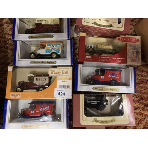 424 - TWELVE BOXED DIE CAST MODELS TO INCLUDE WHISKY VAN AND DAYS GONE TRAM