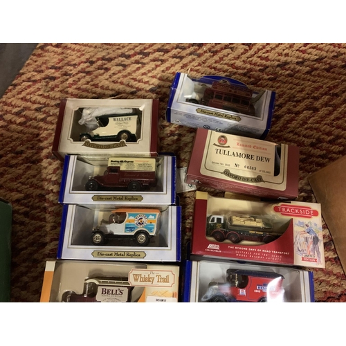 424 - TWELVE BOXED DIE CAST MODELS TO INCLUDE WHISKY VAN AND DAYS GONE TRAM