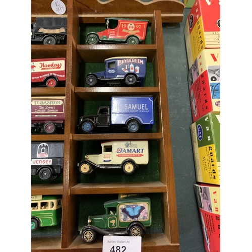 482 - AN ASSORTMENT OF BRANDED DIE CAST REPLICA MODEL VEHICLES WITH DISPLAY CASE TO INCLUDE 'H SAMUEL' AND... 