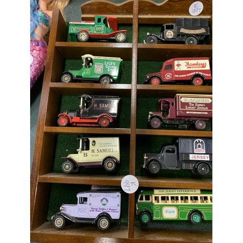 482 - AN ASSORTMENT OF BRANDED DIE CAST REPLICA MODEL VEHICLES WITH DISPLAY CASE TO INCLUDE 'H SAMUEL' AND... 