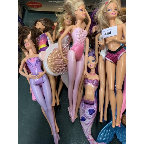 484 - AN ASSORTMENT OR BARBIE DOLLS TO INCLUDE MERMAID BARBIE