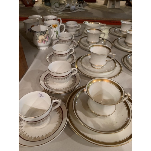 1005 - A LARGE QUANTITY OF CHINA TO INCLUDE WHITE WITH GOLD DETAIL, COMMEMORATIVE CUPS ETC