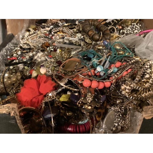 1020 - A LARGE QUANTITY OF COSTUME JEWELLERY TO INCLUDE BOTH METAL AND WOODEN ITEMS