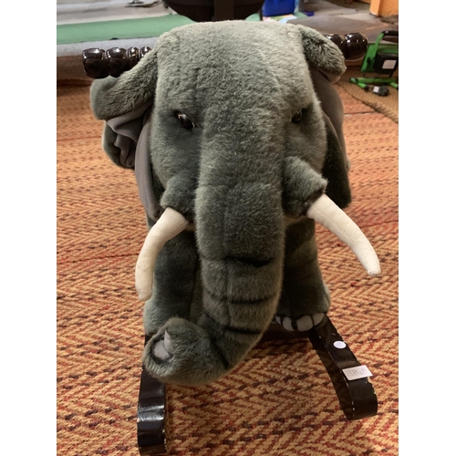 384A - AN ELEPHANT ROCKING HORSE ON WOODEN ROCKERS