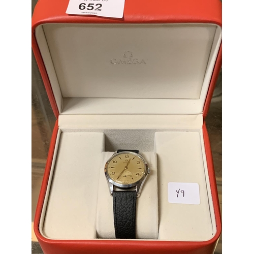 652 - AN OMEGA BOXED GENTS WATCH WITH BLACK LEATHER STRAP