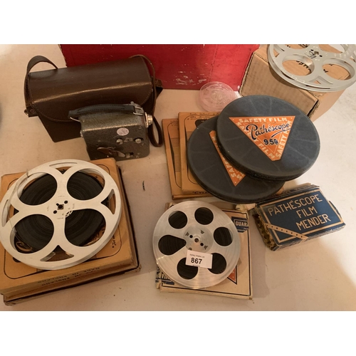 867 - A PATHESCOPE ACE CAMERA ALONG WITH SEVERAL REELS OF FILM AND FILM MENDER