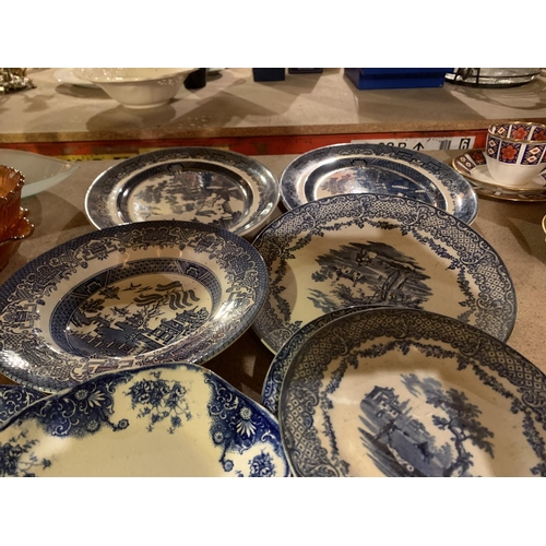 958 - AN LARGE ASSORTMENT OF BLUE AND WHITE CERAMIC WARE TO MAINLY INCLUDE PLATES AND A BOWL