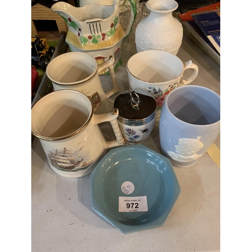 972 - AN ASSORTMENT OF CERAMIC WARE TO INCLUDE A THATCH COTTAGE JUG AND A PAIR OF MUGS