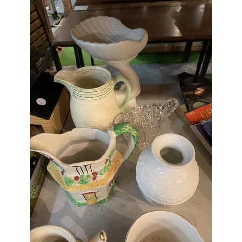 972 - AN ASSORTMENT OF CERAMIC WARE TO INCLUDE A THATCH COTTAGE JUG AND A PAIR OF MUGS