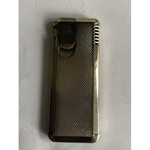 605 - A WHITE METAL LIGHTER POSSIBLY SILVER