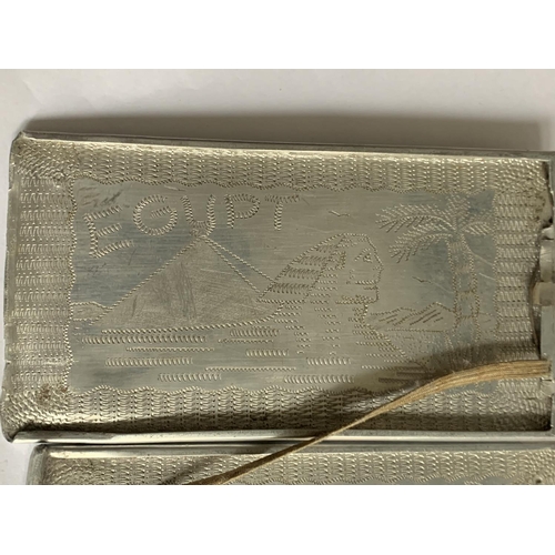 606 - A WHITE METAL TRENCH ART CIGARETTE CASE EGRAVED EYGPT  INSIDE (HINGES A/F)