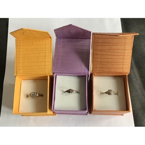 628 - THREE BOXED RINGS STAMPED SILVER AND 925