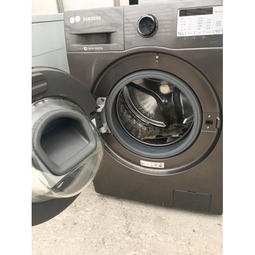 1702 - A SILVER SAMSUNG 9KG WASHING MACHINE BELIEVED TO BE IN WORKING ORDER BUT NO WARRANTY