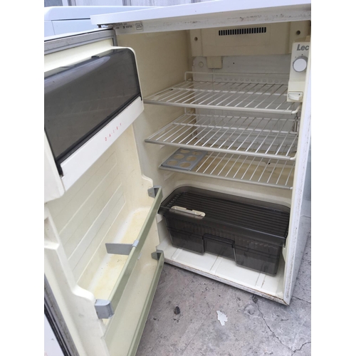 1704 - A WHITE TURBO LARDER UNDER COUNTER FRIDGE BELIEVED IN WORKING ORDER BUT NO WARRANTY