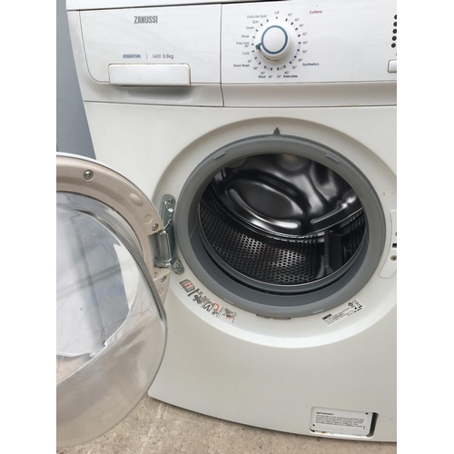 1706 - A WHITE ZANUSSI WASHING MACHINE BELIEVED IN WORKING ORDER BUT NO WARRANTY