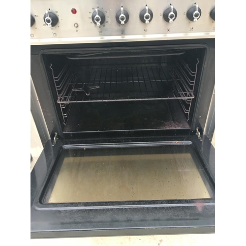 1708 - AN INDUSTRIAL INDESIT GAS COOKER AND HOB