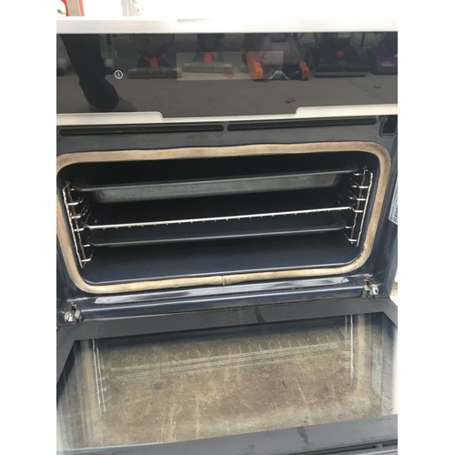 1713 - AN INTEGRATED OVEN AND GRILL DIRECT WIRED