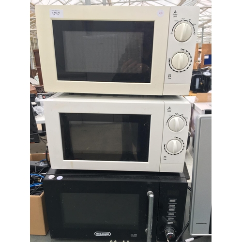 1717 - AN ASSORTMENT OF MICROWAVE OVENS TO INCLUDE A DELONGHI ALL BELIEVED IN WORKING ORDER BUT NO WARRANTY