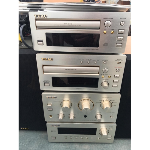 1723 - A TEAC HI-FI SYSTEM WITH SPEAKERS BELIEVED IN WORKING ORDER BUT NO WARRANTY