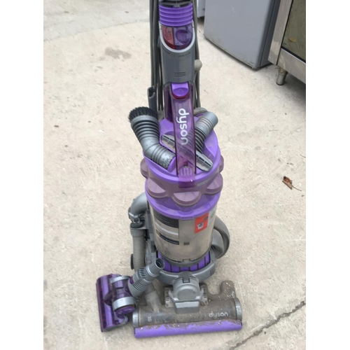 1729 - AN UPRIGHT DYSON DC15 WITH PET HAIR ATTACHMENT BELIEVED IN WORKING ORDER BUT NO WARRANTY