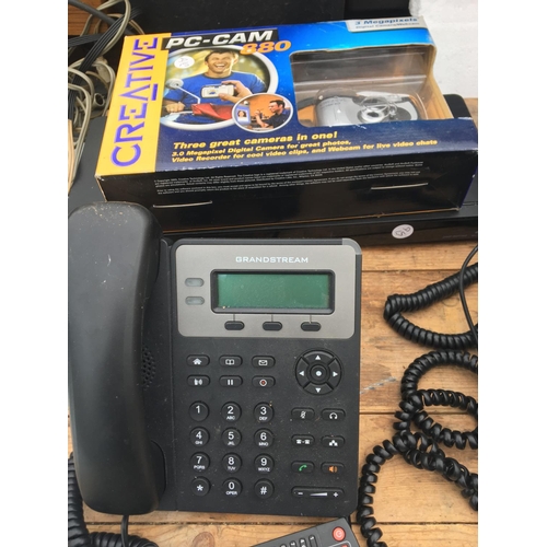 1743 - AN ASSORTMENT OF ELECTRICAL GOODS TO INCLUDE OFFICE PHONES AND A DVD PLAYER