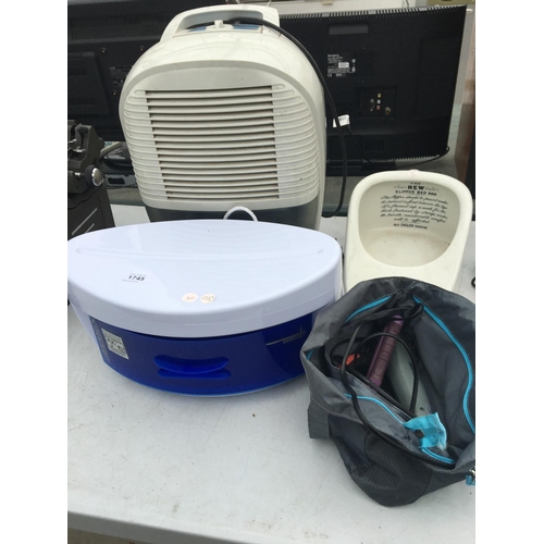 1745 - A DELONGHI DEHUMIDIFIER, A GERMEX BRUSH AND COMB SANITISER ETC BELIEVED TO BE IN WORKING ORDER BUT N... 